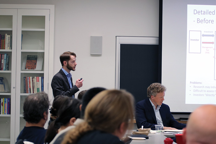 Image of Yury Kucheev speaking at the Weatherhead Forum